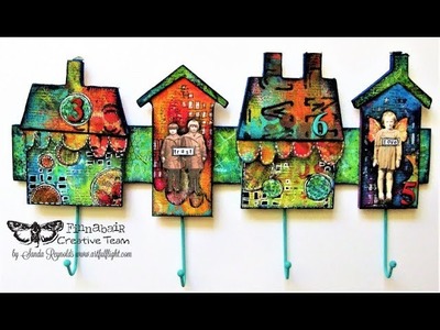 Home is not a place .  it's a feeling - altered key hanger by Sanda Reynolds