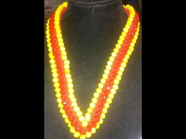 The tutorial on how to make this beautiful red and yellow beaded necklace.