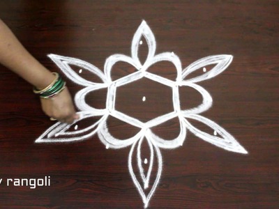 Muggulu designs with 5 to 3 interlaced dots - easy rangoli art designs with dots - kolam designs