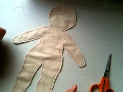 Cloth doll tutorial 3: Cutting around the doll and snips