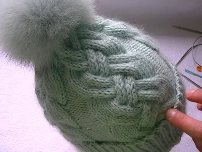 Knitting a hat with the pattern "complicated braid'