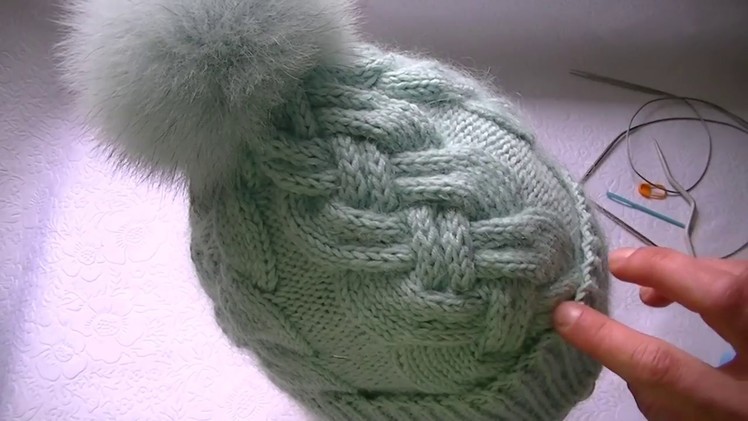 Knitting a hat with the pattern "complicated braid'