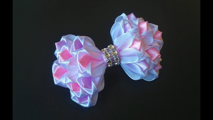 The decoration on the hairpin Kanzashi. Multicolor bow