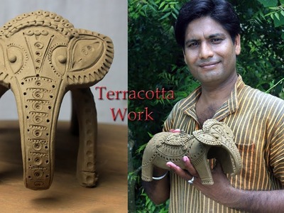 Unique clay sculpture of an elephant. Handmade terracotta sculpture.