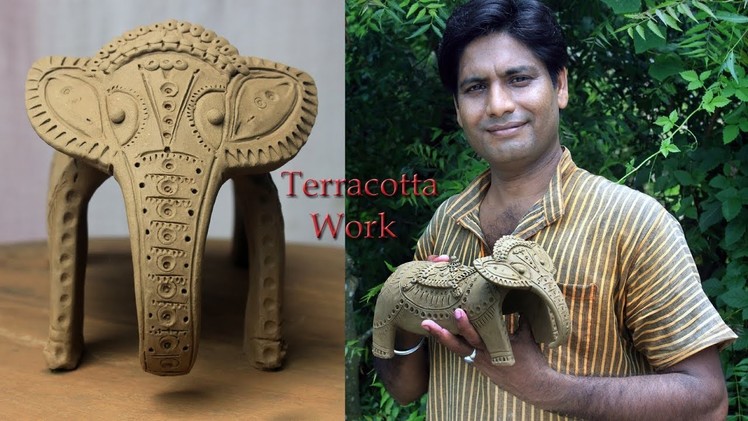 Unique clay sculpture of an elephant. Handmade terracotta sculpture.