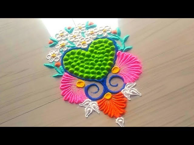 How to make rangoli.innovative and fancy rangoli design.beautiful heart shape rangoli by Jyoti