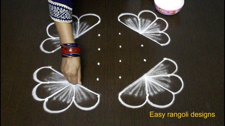 Latest muggulu rangoli designs with 6 dots - small kolam designs