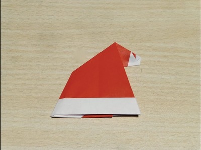 【DIY craft】How to make Santa's hat. Origami. The art of folding paper.