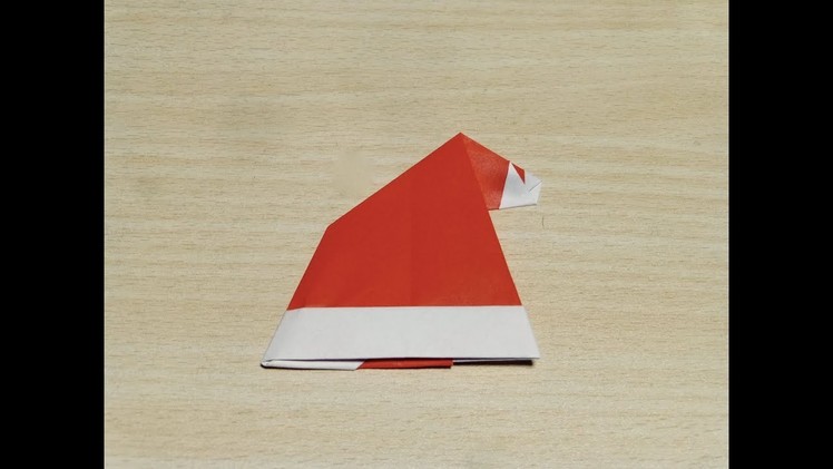【DIY craft】How to make Santa's hat. Origami. The art of folding paper.
