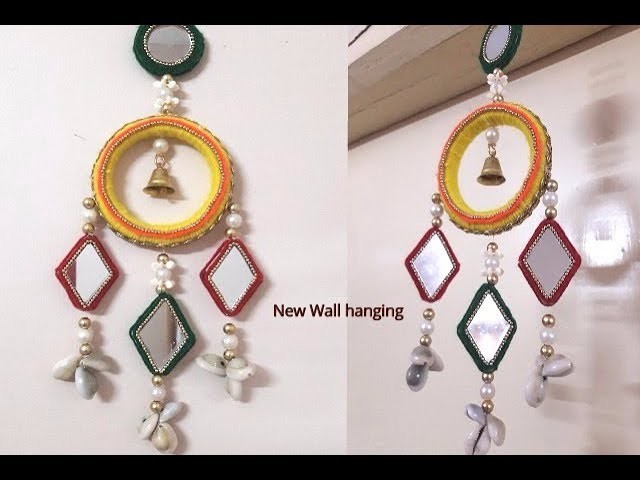 Wind chimes with bangles and wool.best out of waste.newspaper craft.wall hanging craft.DIY