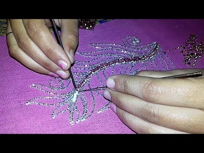 Embroidery work on dress. moti jarkan katdana beads uses