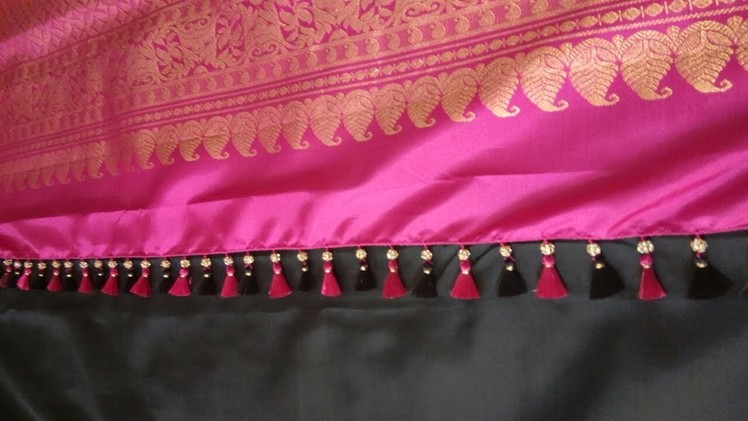 Saree kuchu design using stone beads