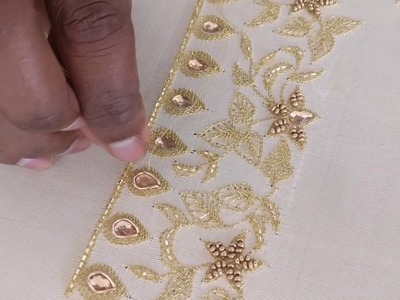Yoke Design for a White Gown using Golden Beads