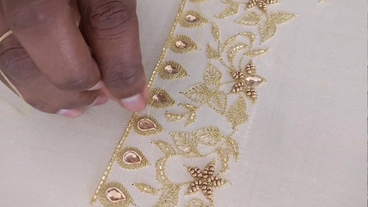 Yoke Design for a White Gown using Golden Beads