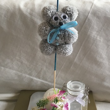 Hand crafted pom pom teddy bear and age cake topper