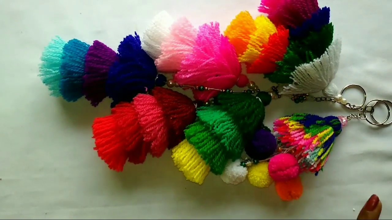 How to make woolen tassel bag charm very easily. Decorate bags with colorful charms.(in English)
