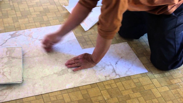 How to install sticky tiles over existing tiles.