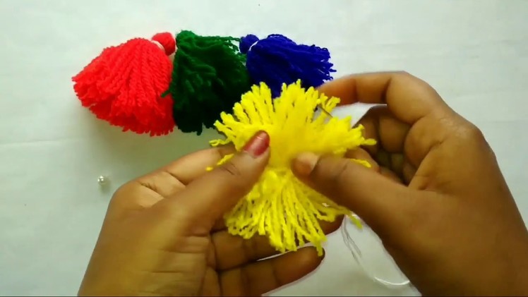 How to make woolen tassel bag charm very easily.Decorate your bags easily at home(in Bangla.Bengali)