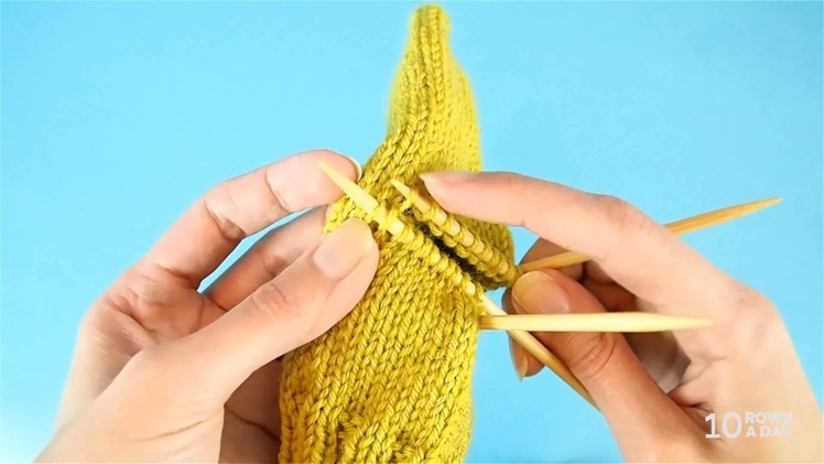 How to pick up stitches reserved for a heel or a pocket