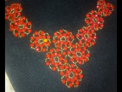 The tutorial on how to make this red and gold necklace