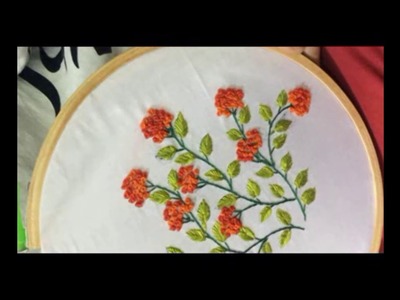 Hand embroidery.  French knot stitch, fish bone stitch flower designs
