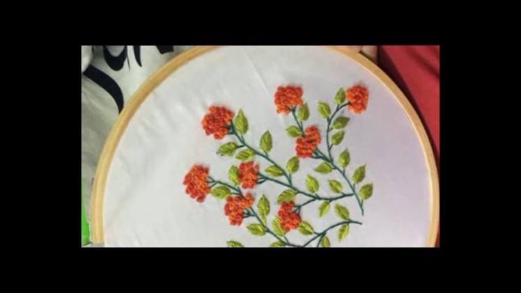 Hand embroidery.  French knot stitch, fish bone stitch flower designs