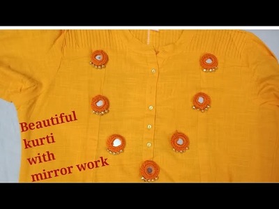 Hand embroidery Kurti with innovative mirror work with ghughru