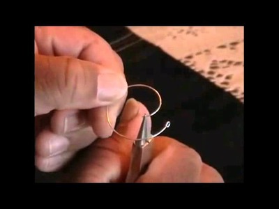 Make heart shaped pendant for earrings from wire.