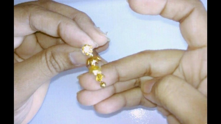 Mini step jhumkas - Making with flower caps | looks like golden jhumkas | jewellery tutorials