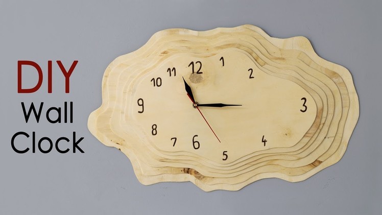 DIY Layered Plywood Wall Clock with a Tree Ring Shape
