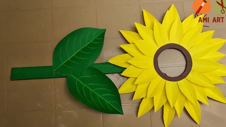 Making paper sunflower costume.