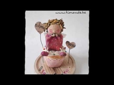 Paper mache fairy on a cupcake