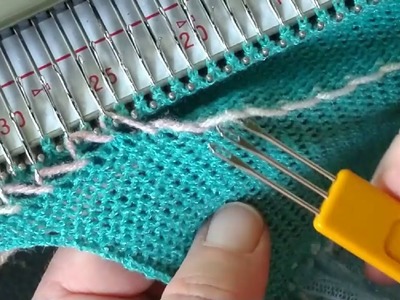 Knitting elastic casings onto the end of a knitted piece