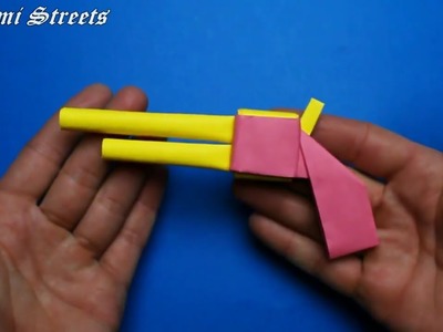 How to make a gun out of paper. Origami Gun