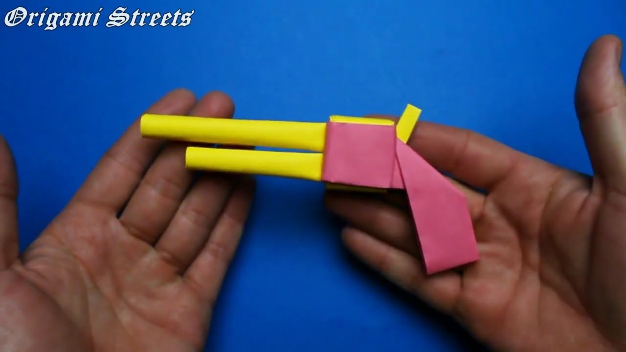 How to make a gun out of paper. Origami Gun