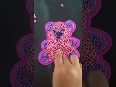 HAMA beads, making a pink bear