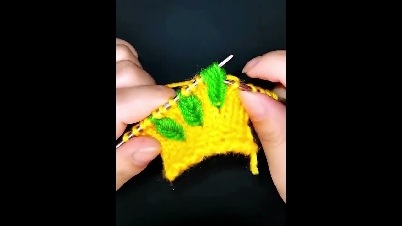 The sweater starts knitting