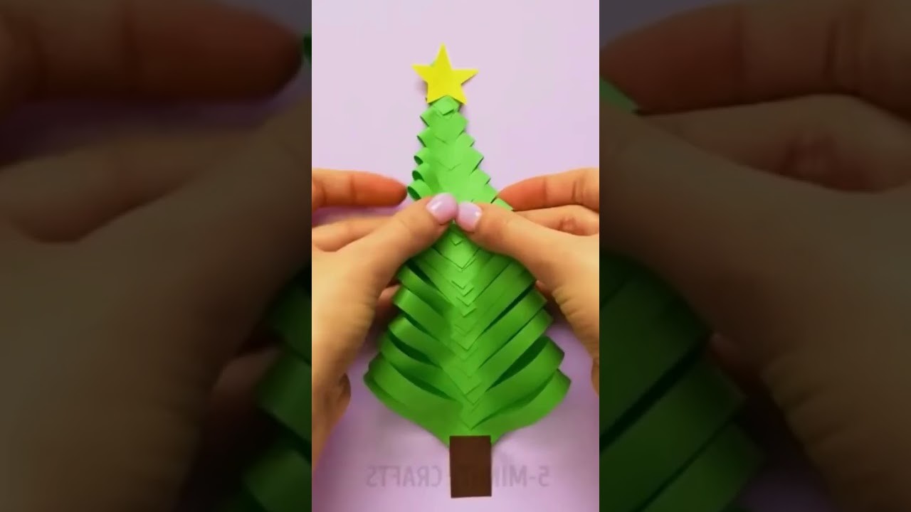 Paper christmas tree with a card