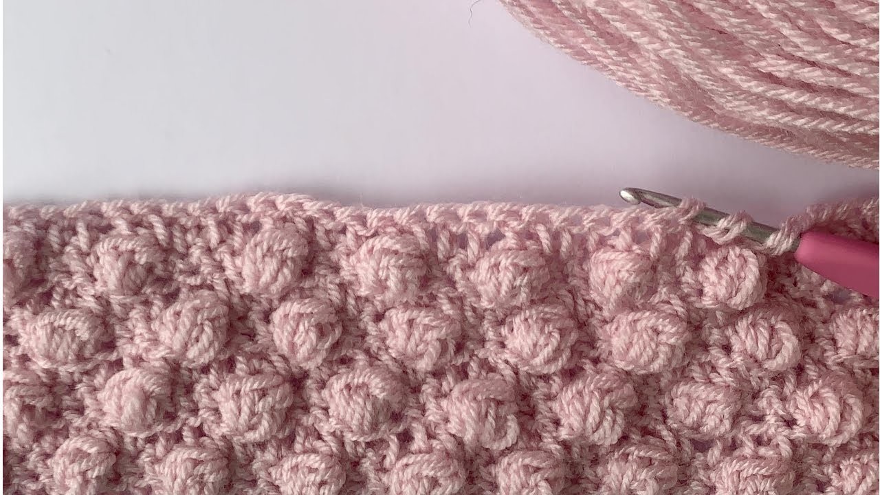 Eye catching! Easy crochet trellis bubble stitch tutorial for baby blankets and more.
