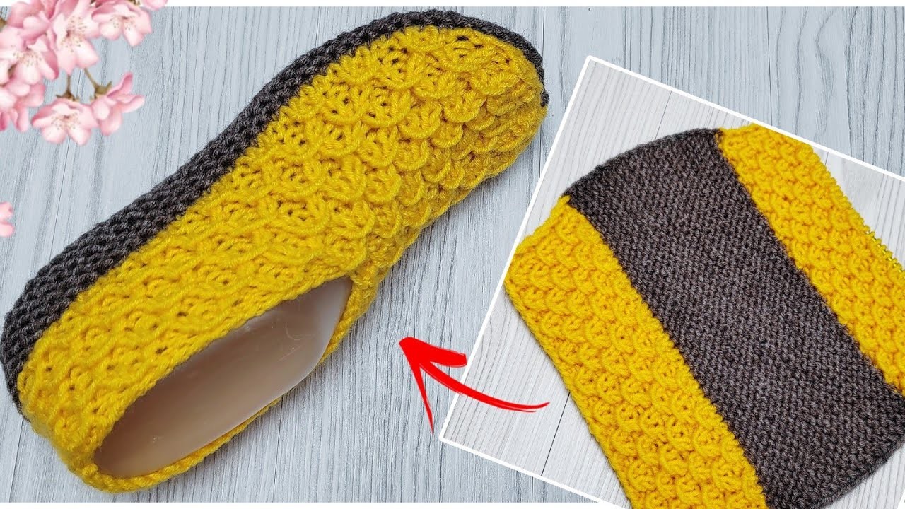 Home knitting socks. Simple slippers with knitting needles without seams on the sole.