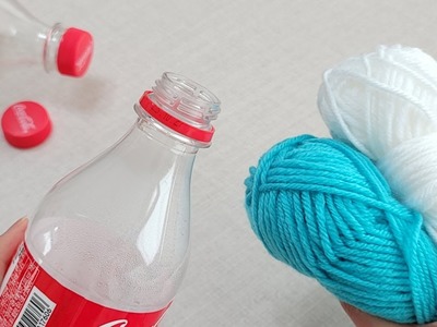 Did a INCREDIBLE job with plastic bottle cap ring, yarn. You'll love this super idea. DIY recycling