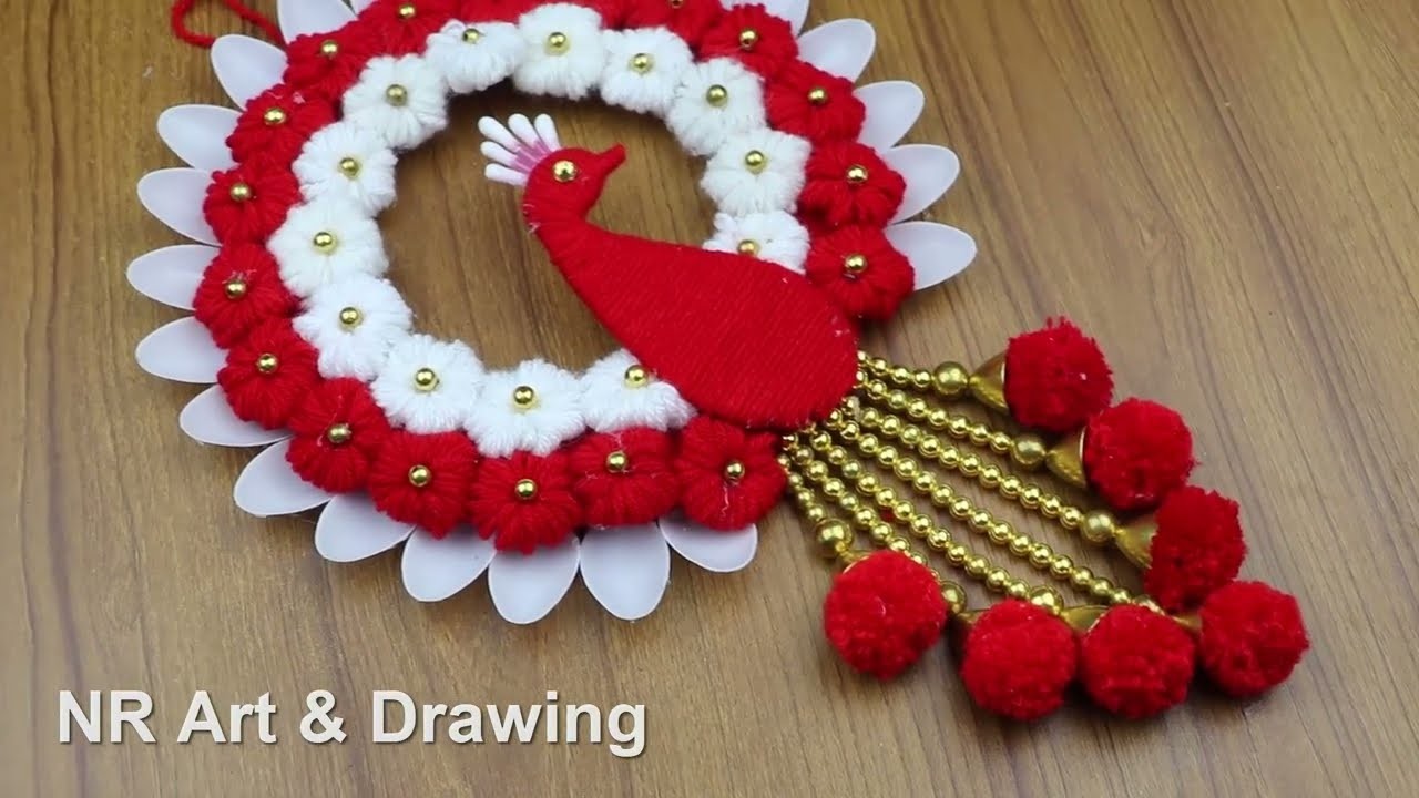 How To Make Beautiful Woolen Flower Wall Hanging Using Plastic Spoon - Best out of waste