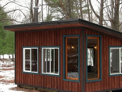 Building a cozy off grid cabin in the woods start to finish