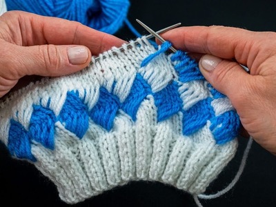 An original pattern with knitting needles worked in 2 colours - it’s knitted easily, remembered!