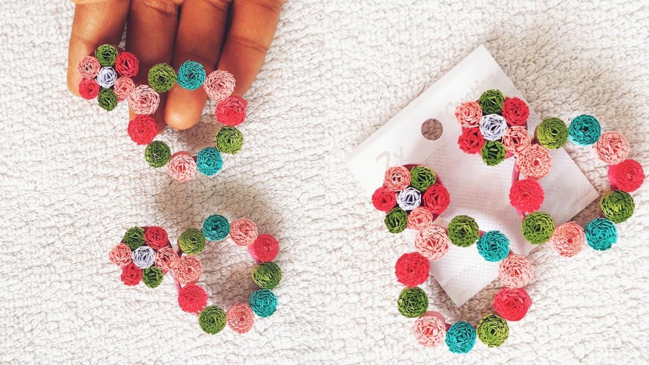 Beautiful handmade quilled flower earrings.DIY