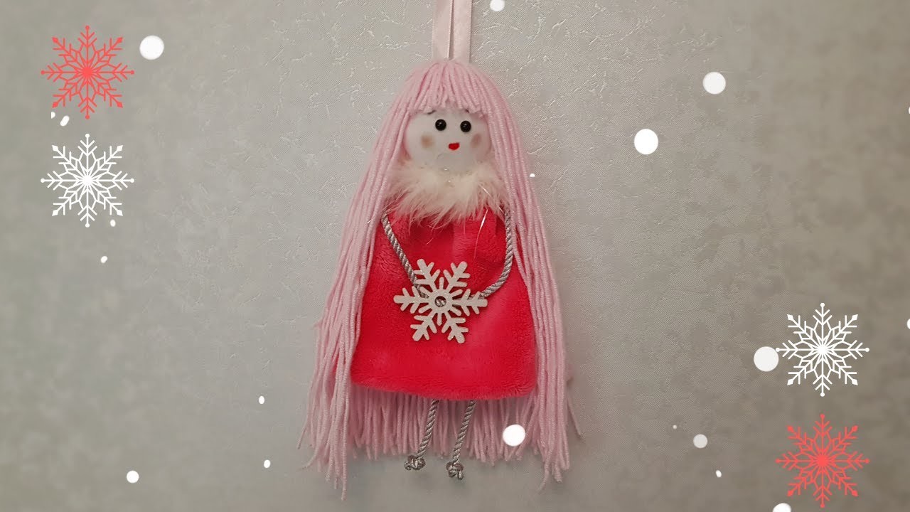 DIY doll with long pink hair made of yarn - CRAFTMANIA