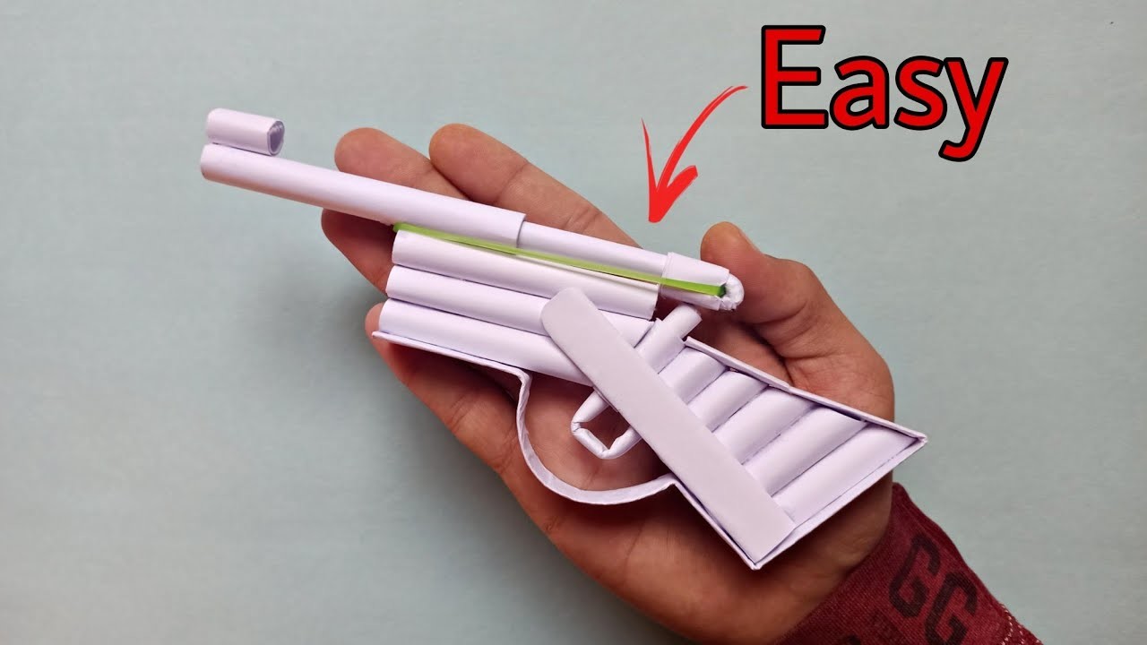 DIY-HOW TO MAKE BULLET SHOOTING MINI GUN FROM A4 PAPER -( Very Effective ! )