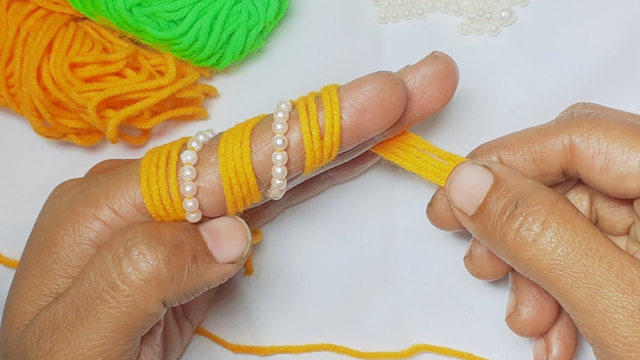 Super Easy &Beautiful Woolen Flower Making Trick With Finger- DIY Woolen Flower -It's so beautiful