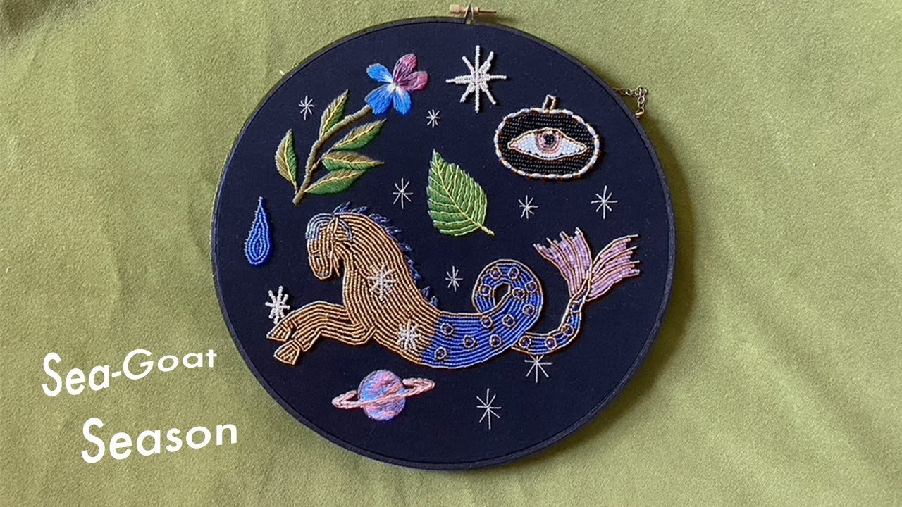 Embroidering and beading a Capricorn Hoop