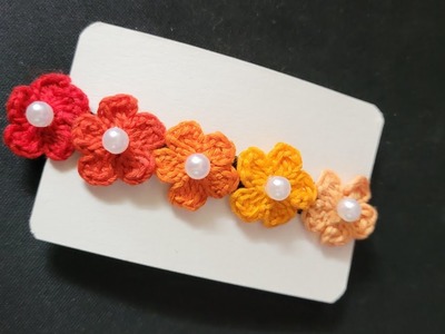 Learn how to decorate hair clip using crochet flowers tutorial.